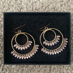 Gold earrings with light pink gems